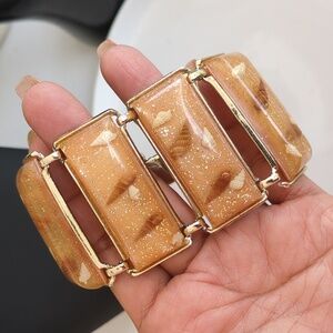 vintage Lucite panel bracelet with embedded seashells and gold glitter. 1950's